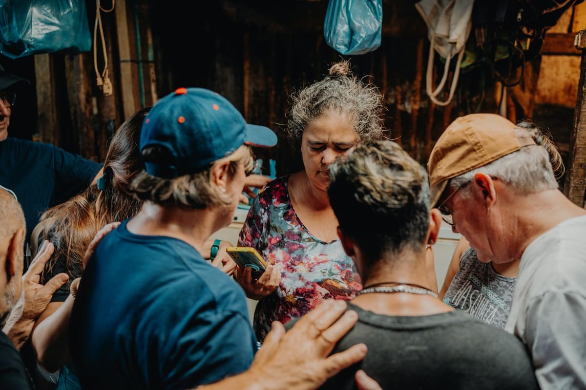 Mission team gathered together in service